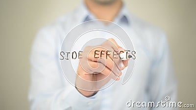 Side Effects, Man writing on transparent screen Stock Photo