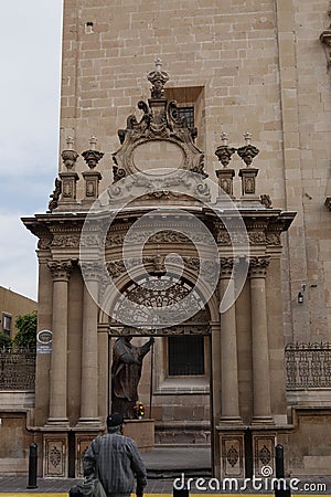 Side entrance and Juan Pablo II statue, Leon, Guanajuato. Editorial Stock Photo