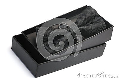 Side facing top down view of a black bow neck tie in a black packaging box Stock Photo