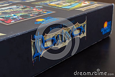 Side Logo View of colourful deck building card game of Dominion the Big Box Editorial Stock Photo