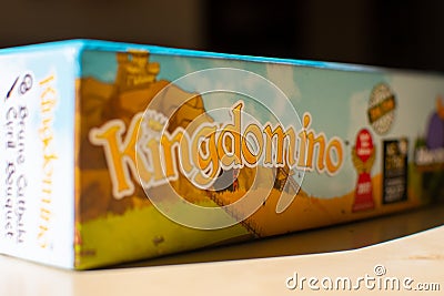 Side logo View of colourful deck family fun game of Kingdomino. Family fun for strategizing and having fun with this entertainment Editorial Stock Photo