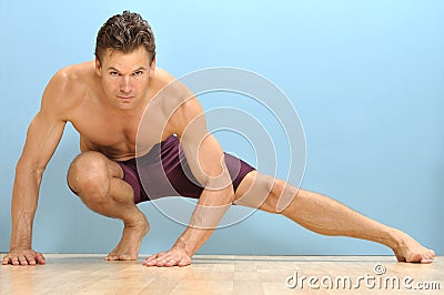 Side lunge stretch Stock Photo