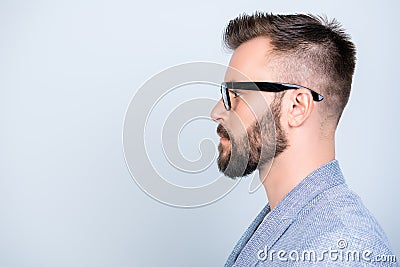 Side profile close up photo of successful young serious handsome Stock Photo