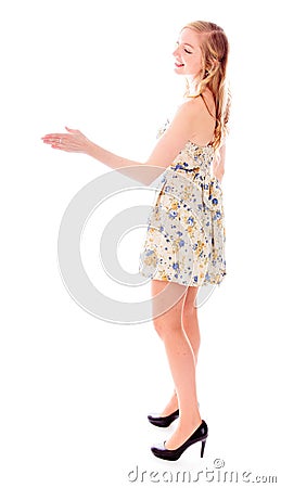 Side profile of a young woman offering hand for handshake Stock Photo