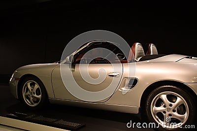 Side of a silver convertible at the Porsche museum Editorial Stock Photo