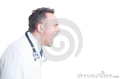 Side view of angry medic or doctor yelling and shouting Stock Photo