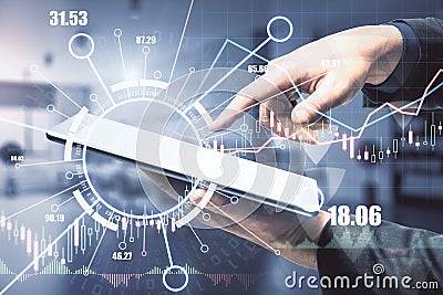 Side view of blurry hand using tablet with abstract digital business forex graph. Market concept. Stock Photo