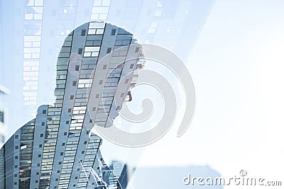 Side view of businessman reflecting on window Stock Photo