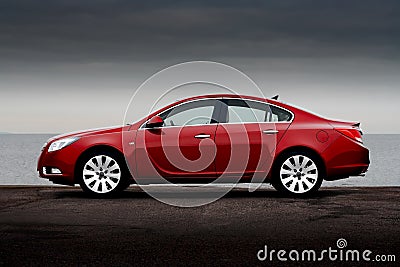 Side view of cherry red car Stock Photo