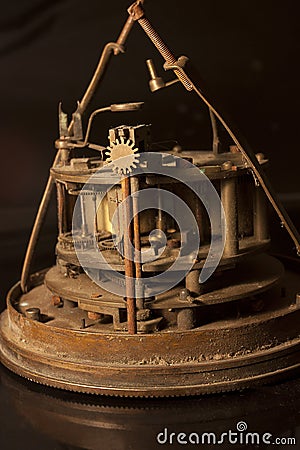 Side view of the cogs and mechanism of an antique clock Stock Photo