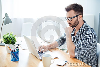 Side view of concentrated ponder man finding way to solve his problems Stock Photo