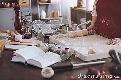 Cookbook and bowls on countertop Stock Photo