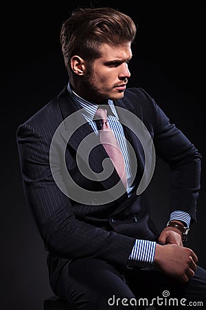 Side view of a fashion model in a classic suit and Stock Photo