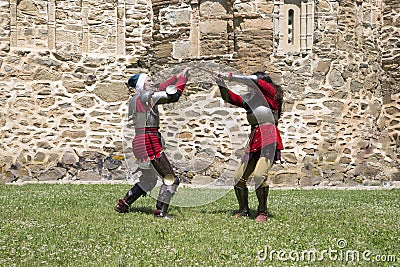 Fight Scene Between Two Brave Medieval Knights At Daylight Stock Photo