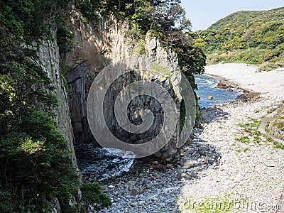 Side view of Hakusan Domon natural arch on cape Ashizuri Stock Photo