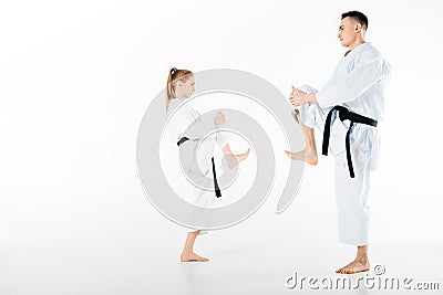 side view of karate fighters stretching legs Stock Photo