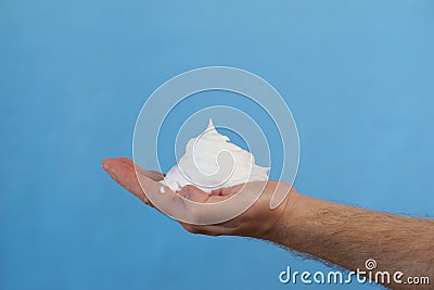 Side view of male hands using shaving foam Stock Photo