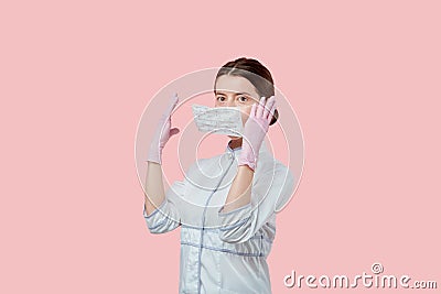 Side view of a masked girl. Instructions on how to wear a mask on your face. Stock Photo