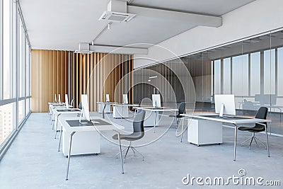 Side view on minimalistic style workspace white tables with modern computers on concrete floor in open space office with wooden Stock Photo