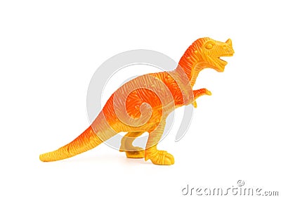 Side view orange plastic dinosaur toy on white background Stock Photo