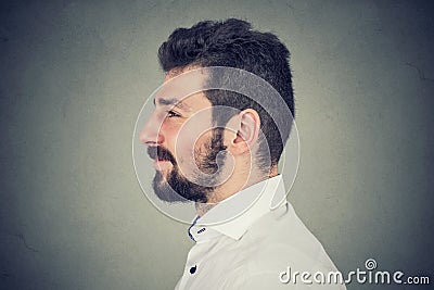 Side view portrait of a smiling bearded man Stock Photo