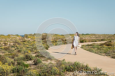 Side view of pretty woman holding Stock Photo