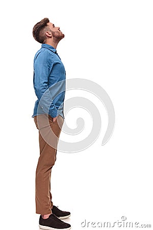 Side view of relaxed casual man looking up Stock Photo