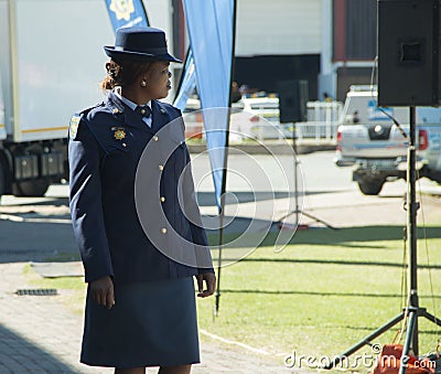 Side view of a South African Police Woman wearing a hat Editorial Stock Photo