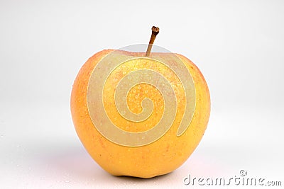 Side view on splattered with little drops of water one isolated apple Stock Photo