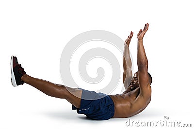 Side view of sportsman exercising Stock Photo