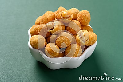 tasty peanuts snack on a small dish Stock Photo