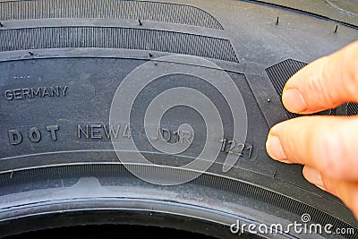 Side view of tire with designation of week and year of tire production Stock Photo