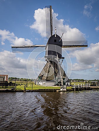 Side view of a windmill at Kinderdijk, Holland Editorial Stock Photo
