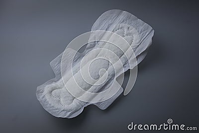 Side view of women sanitary pad on grey background Stock Photo