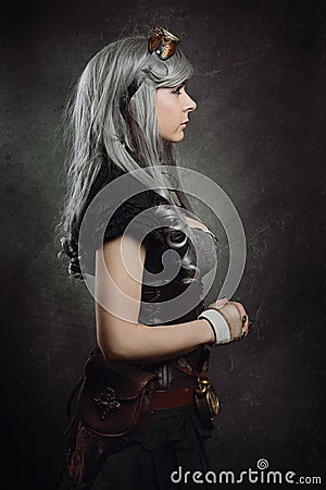 Sideaways portrait of a steampunk girl Stock Photo