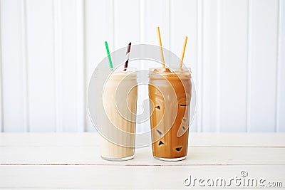 sidebyside iced coffees showing different milk alternatives Stock Photo