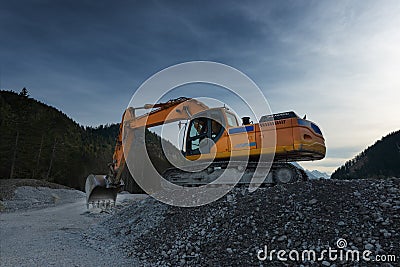 Sideview of huge orange shovel excavator Stock Photo