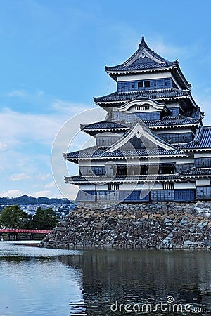 Japanese Matsumoto Black Castle red bridge Stock Photo