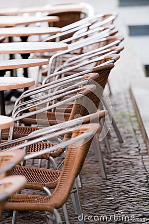 Sidewalk cafe chairs Stock Photo