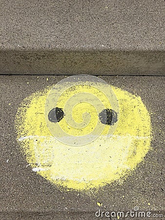 Sidewalk Chalk Face mask smilie face Stock Photo