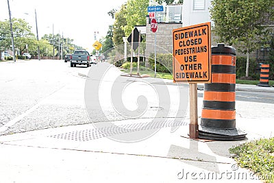 tor, canada - august 14, 2023: sidewalk closed pedestrians use other sidewalk writing caption text orange black 19 p 17 h Editorial Stock Photo
