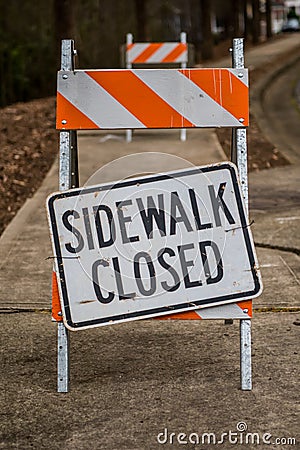 Sidewalk Closed Sign Askew on Stand Full Frame Stock Photo