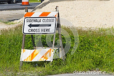 Sidewalk Closed Sign due to Road Construction Stock Photo