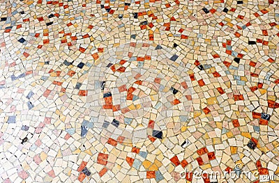 Sidewalk of a downtown street with grid mosaic pavement of small square marble pieces Stock Photo