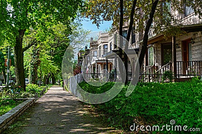 Sidewalk next to a Row of Old Homes in Logan Square Chicago Stock Photo