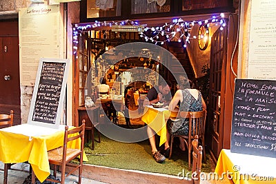 Sidewalk restaurant in Nice, France Editorial Stock Photo