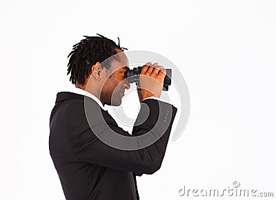 Sidewise closeup of businessman with binoculars Stock Photo