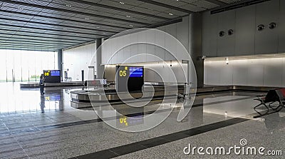 Siem Reap, Cambodia -December 10, 2023 : New Siem Reap-Angkor International Airport (SAI), arrivals area, baggage claim Editorial Stock Photo