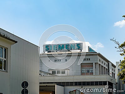 Siemens Logo on top of a Building Editorial Stock Photo