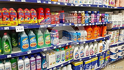 Supermarket shelves with cleaning products: detergents, disinfectants, soap, floor cleaners Editorial Stock Photo